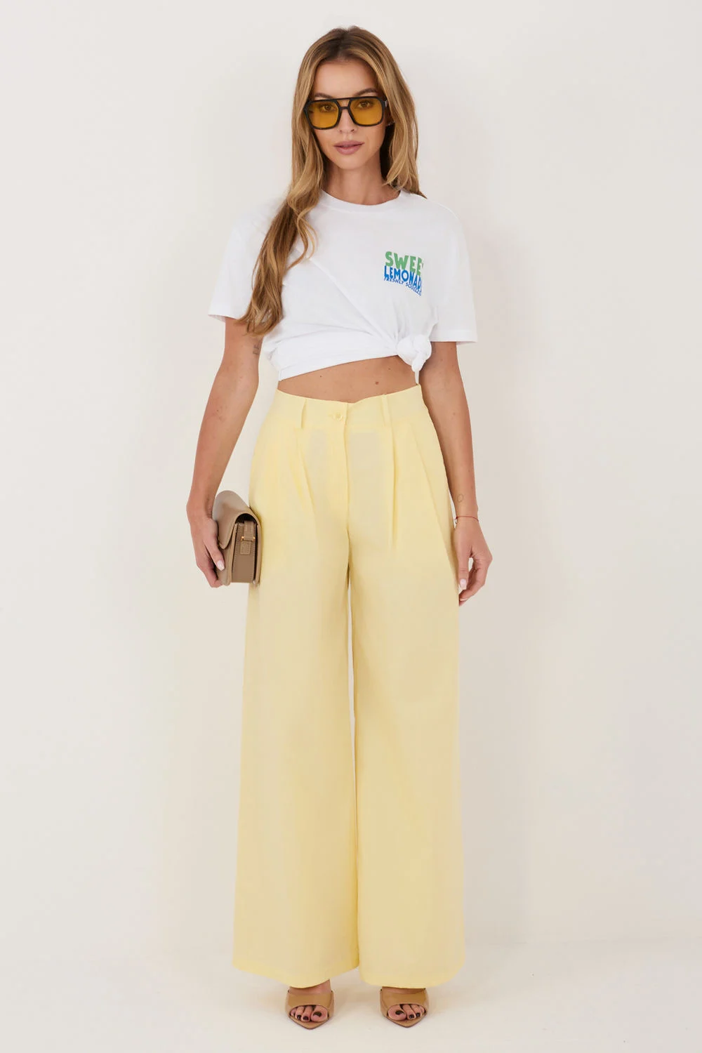 Pantalon palazzo jaune à plis