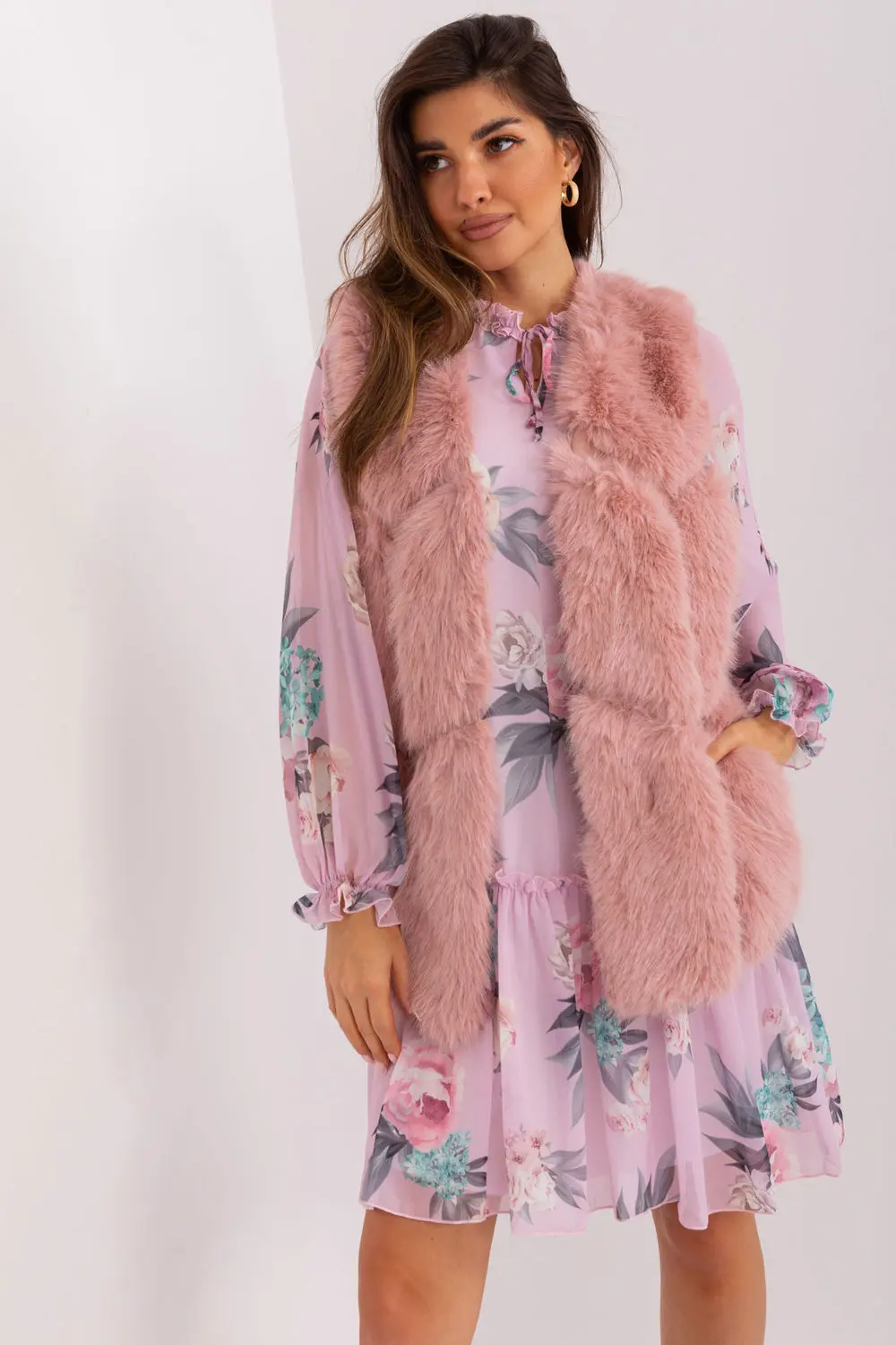 Gilet en fausse fourrure rose à capuche