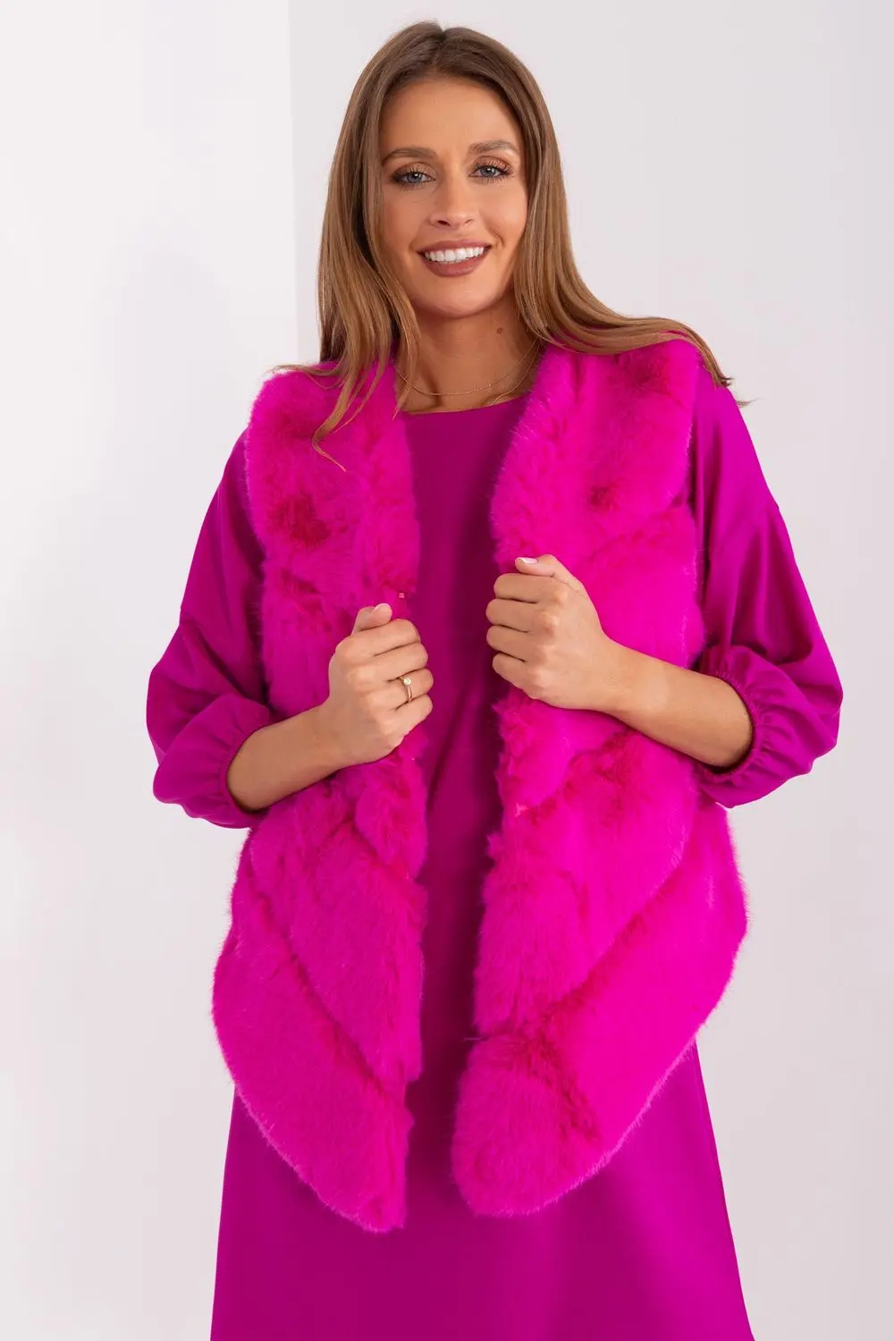Gilet en fausse fourrure rose