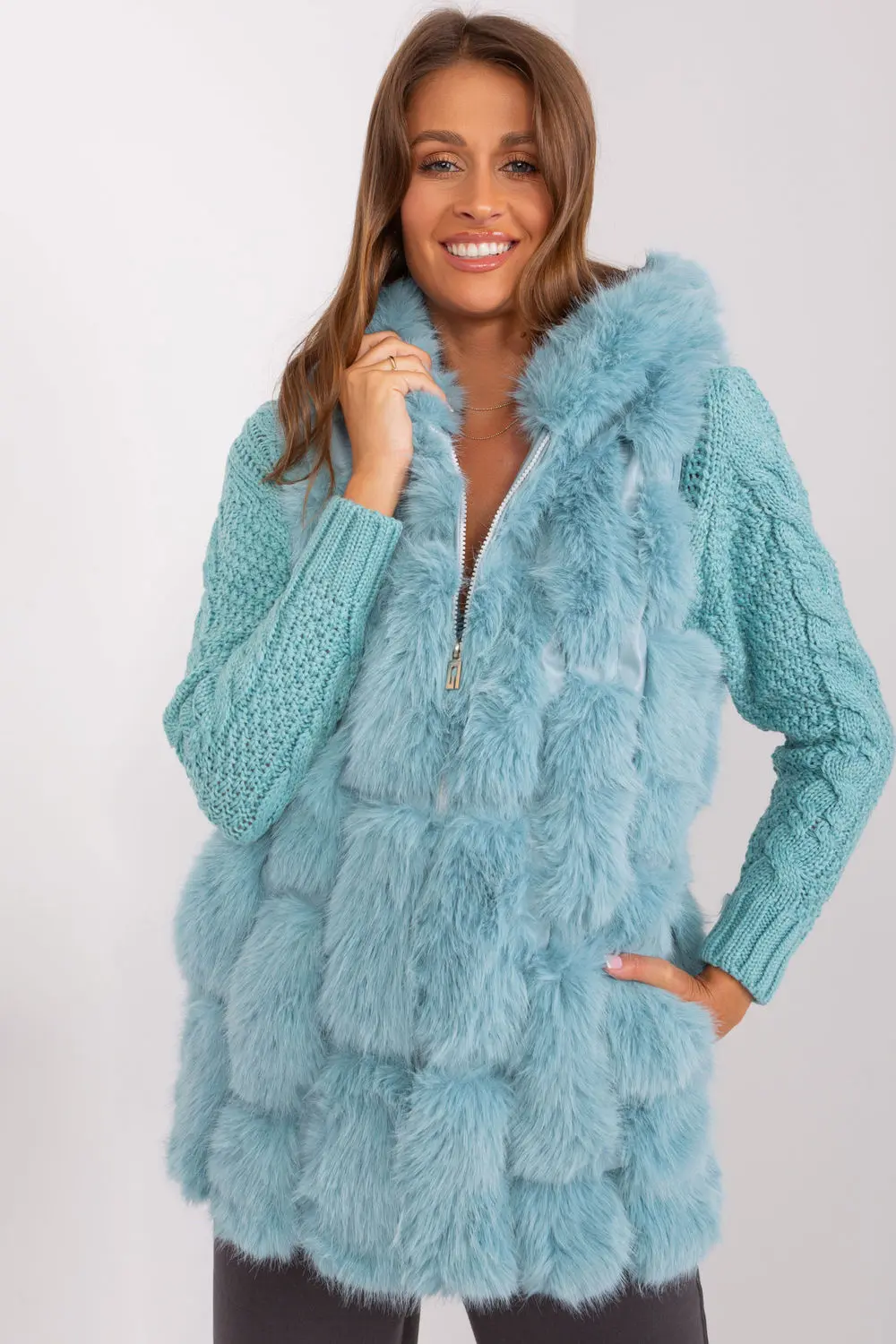 Gilet en fausse fourrure vert à capuche
