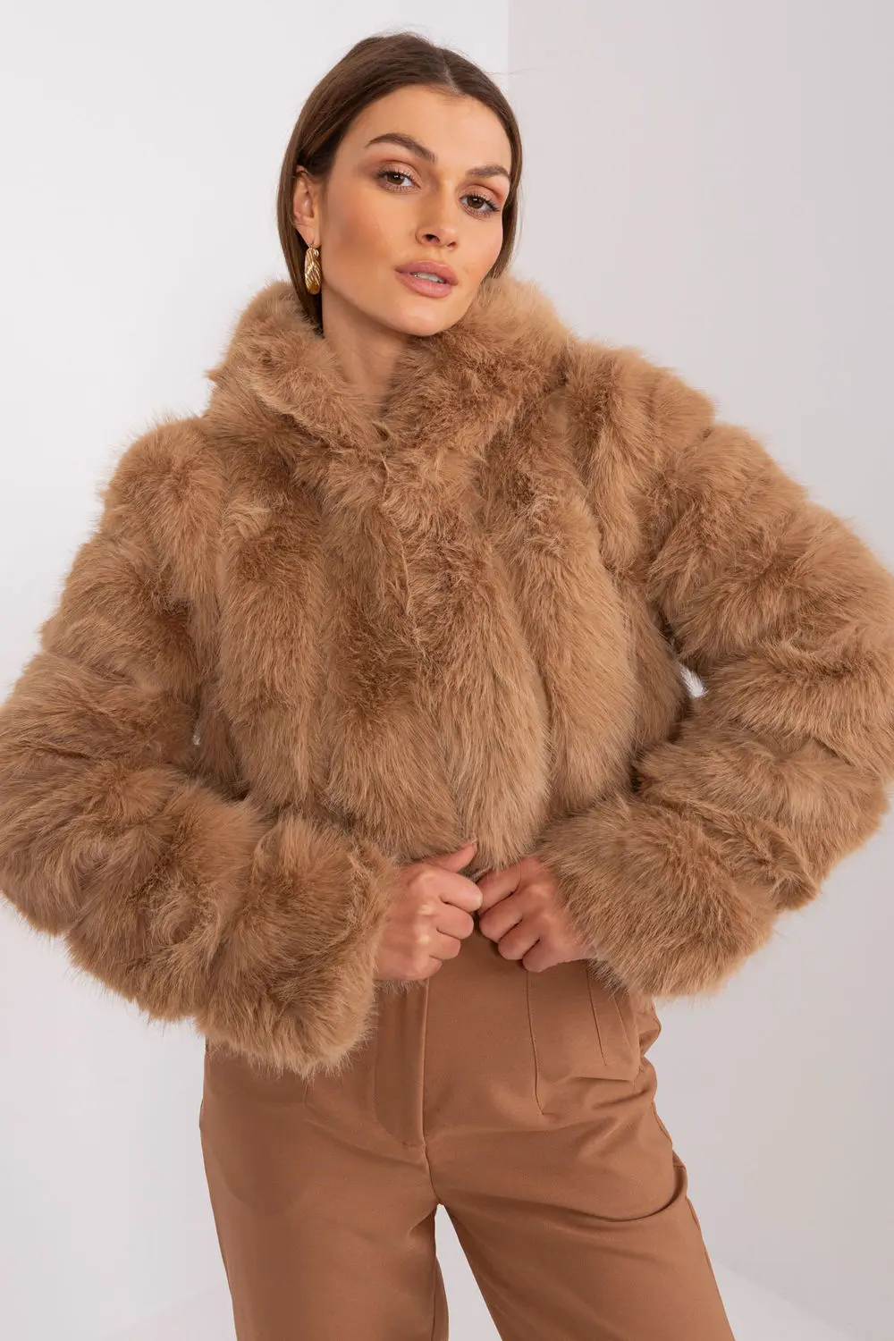 Veste en fausse fourrure brune à capuche
