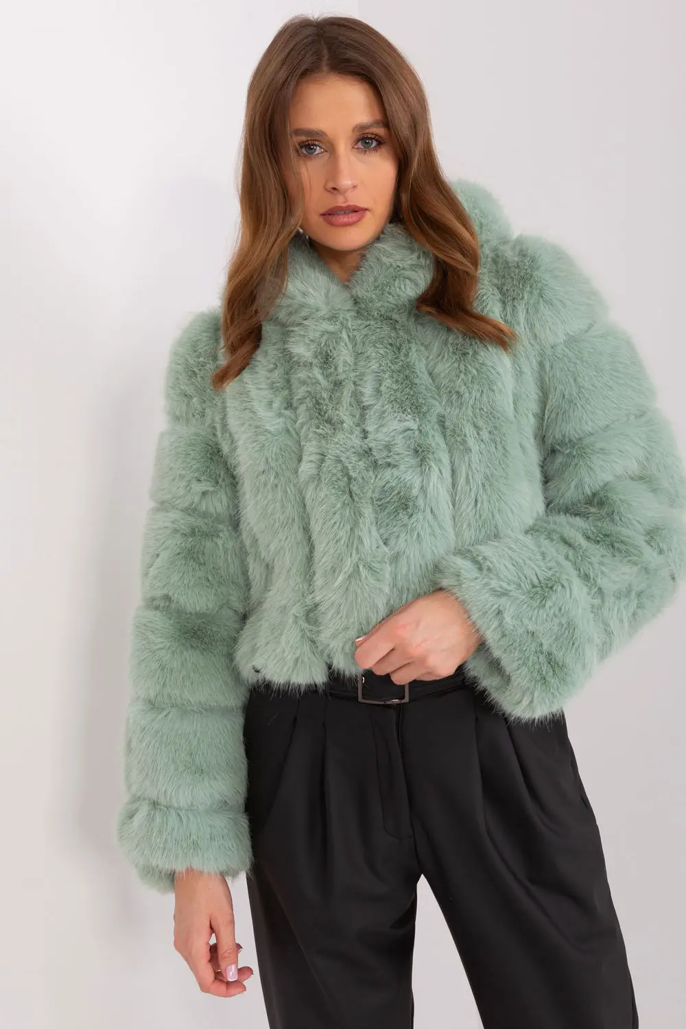 Veste en fausse fourrure verte à capuche