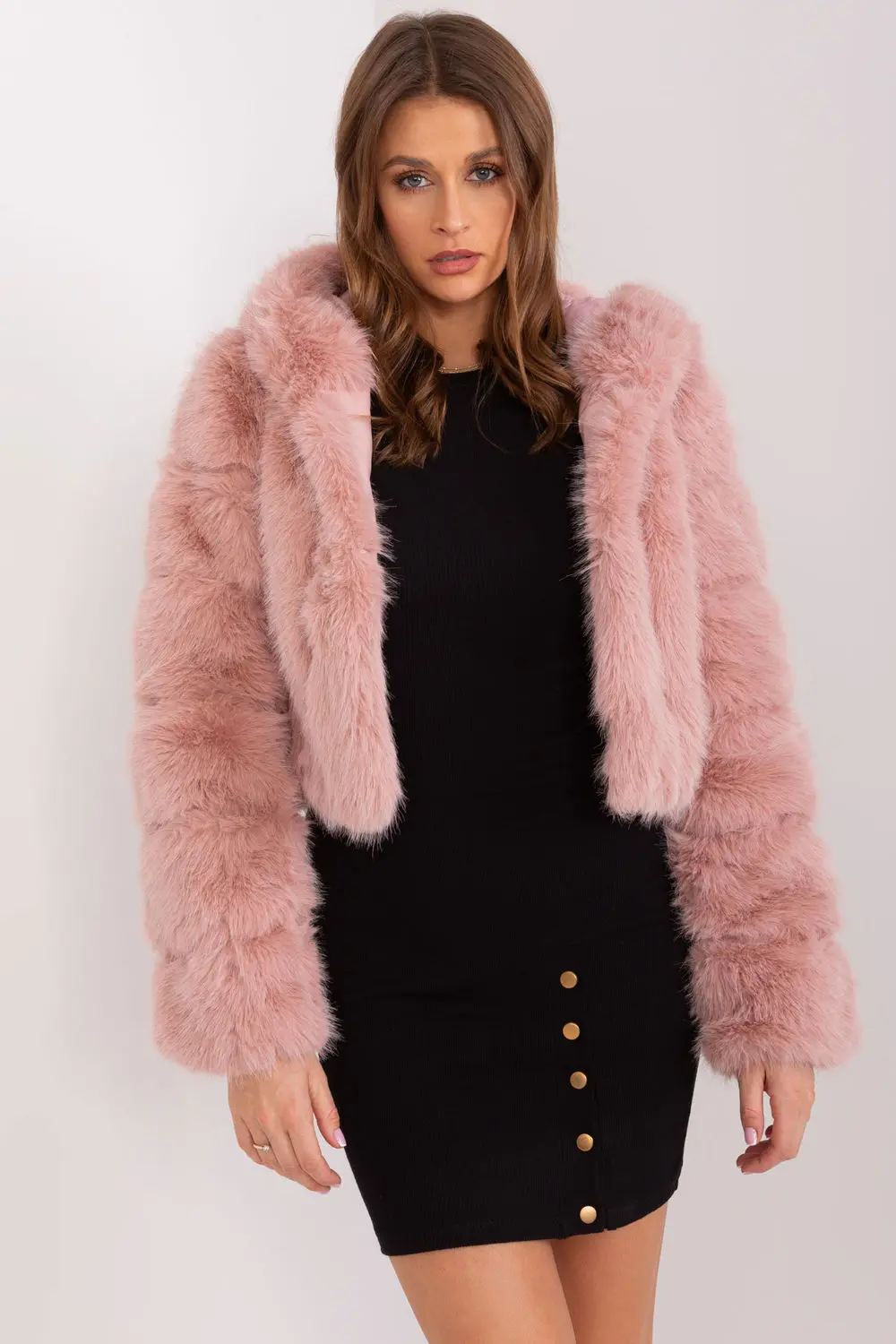 Veste en fausse fourrure rose à capuche