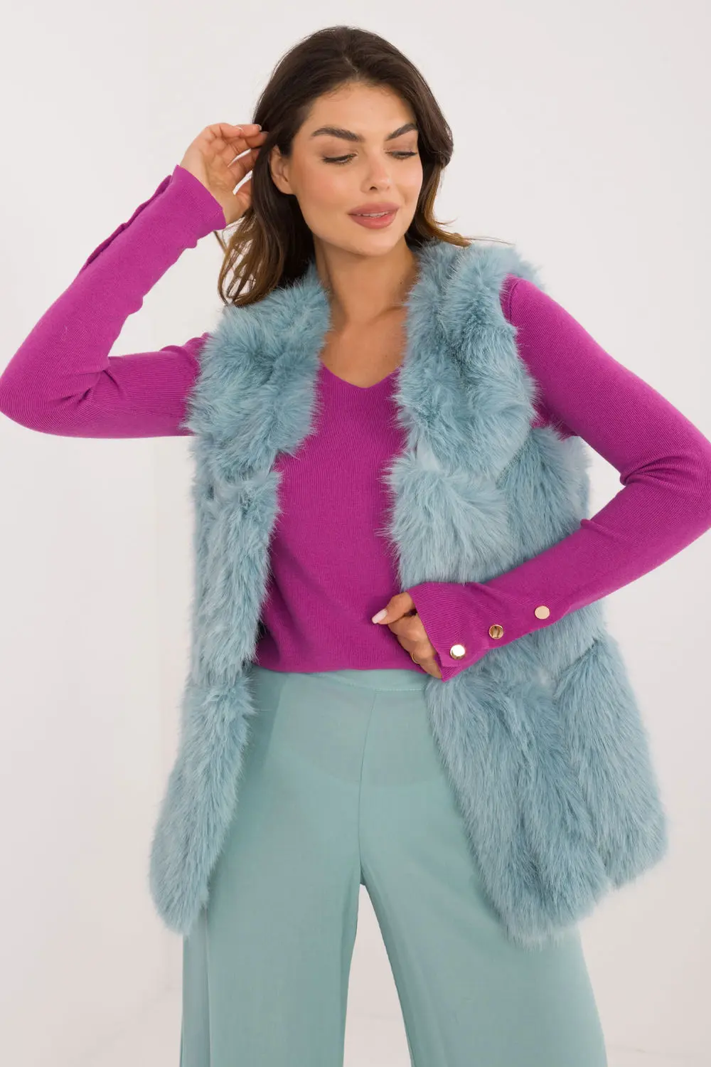 Gilet en fausse fourrure vert à capuche
