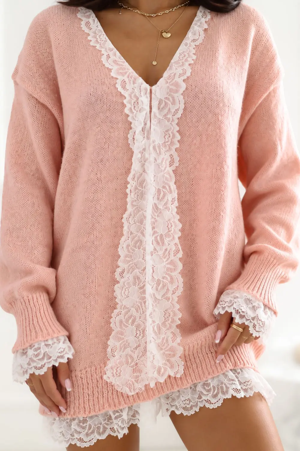 Chandail oversize rose décolleté en V