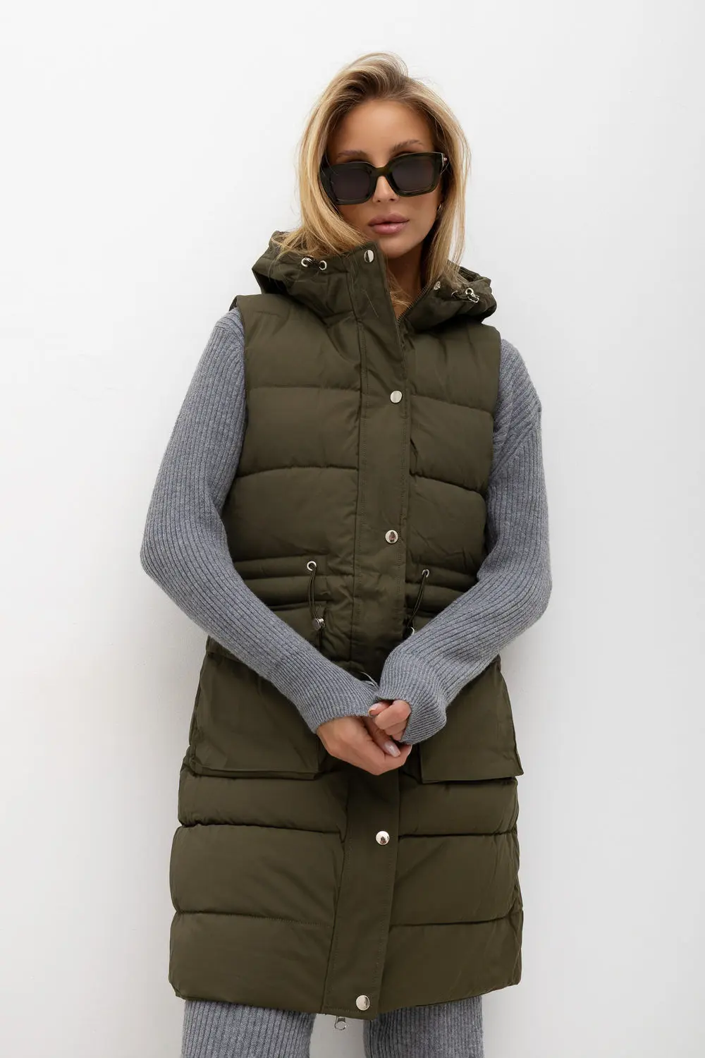 Gilet matelassé vert à capuche