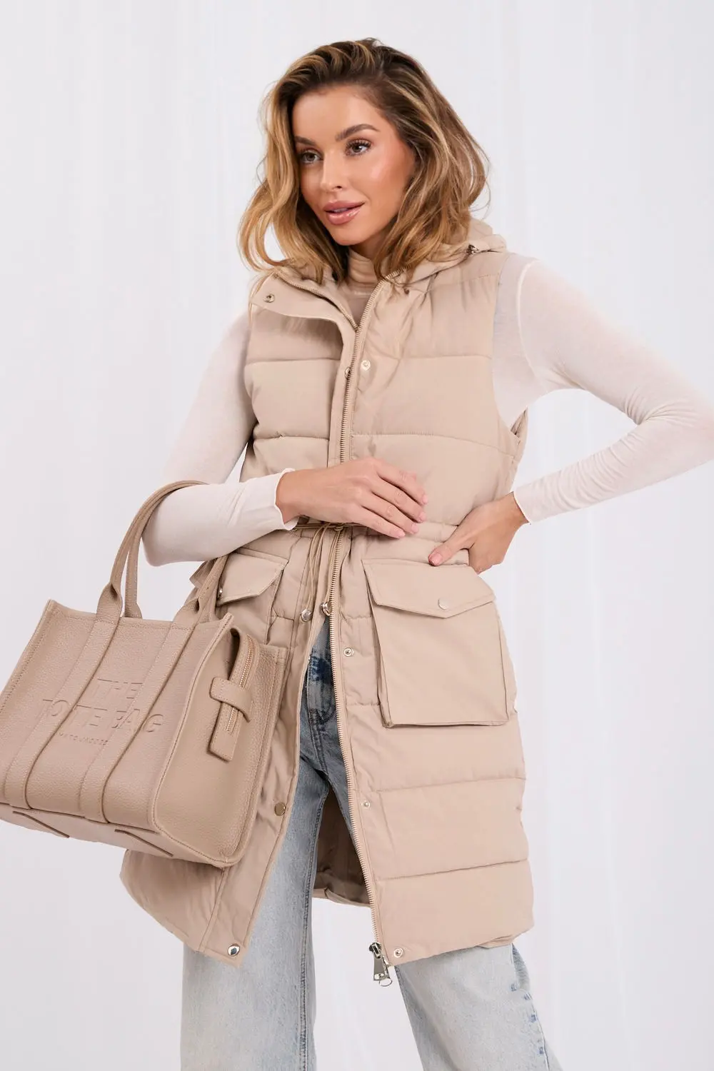 Gilet matelassé beige à capuche